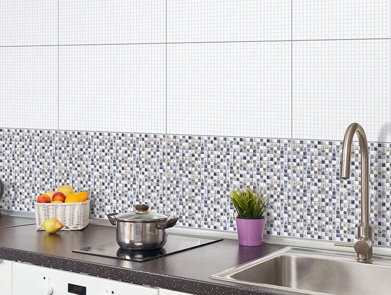 Functional simple kitchen design featuring a checkered tile wall